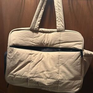 Elegant Tan Quilted Travel Bag